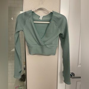 Beautiful green cropped long sleeve shirt , never worn